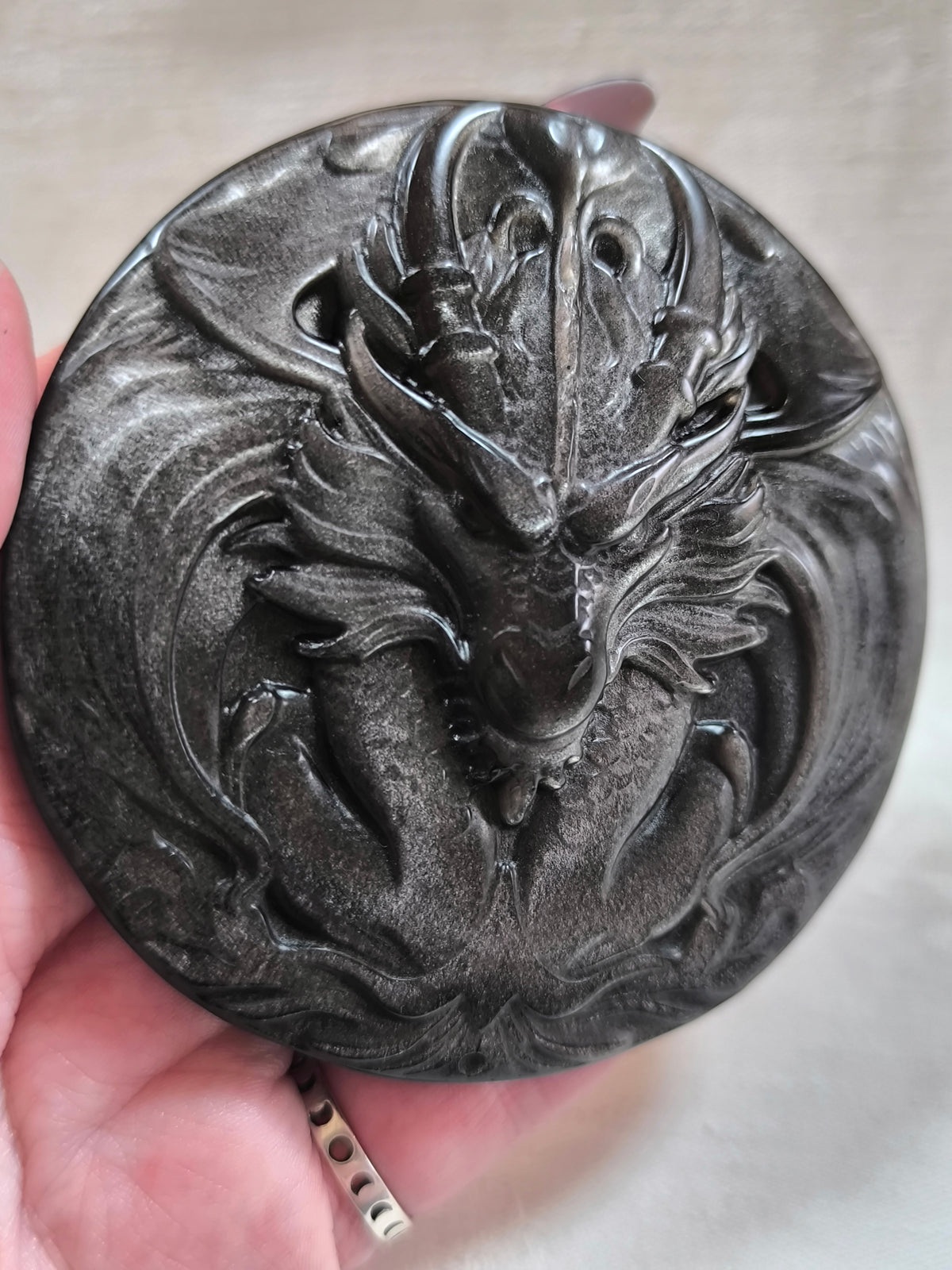 Silver sheen obsidian dragon carving