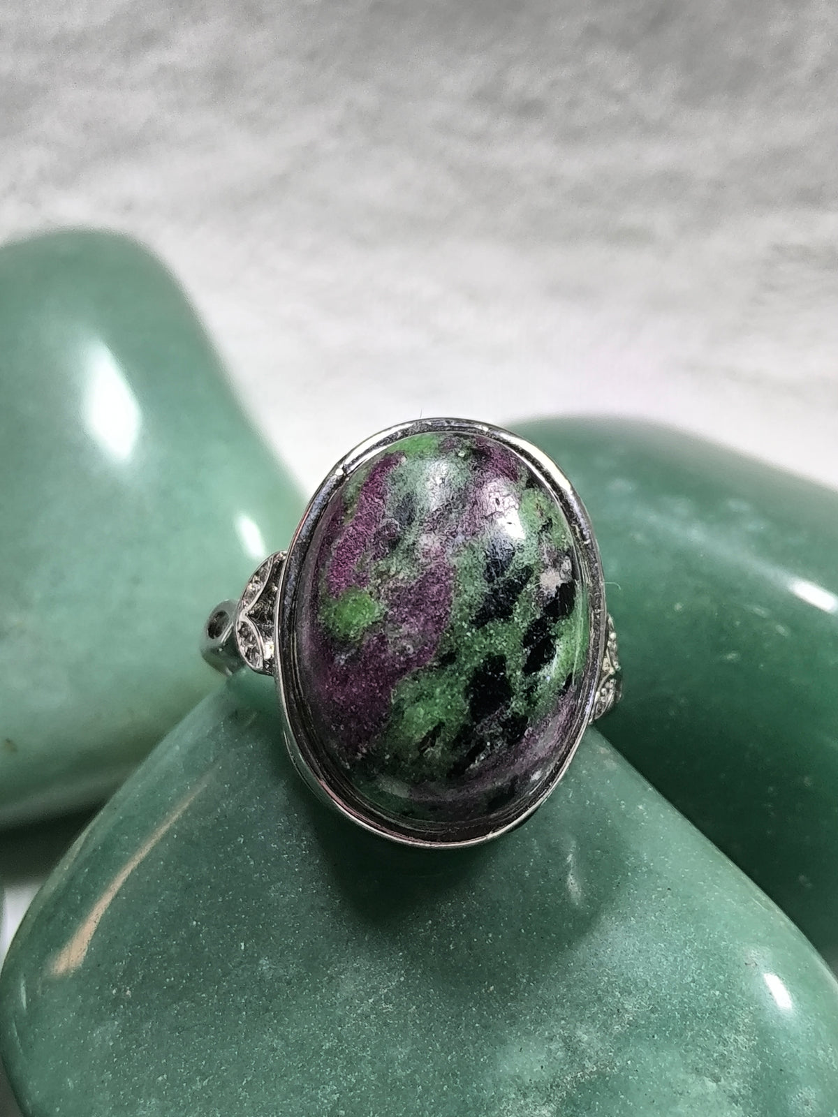 Stainless steel adjustable ruby in zosite ring
