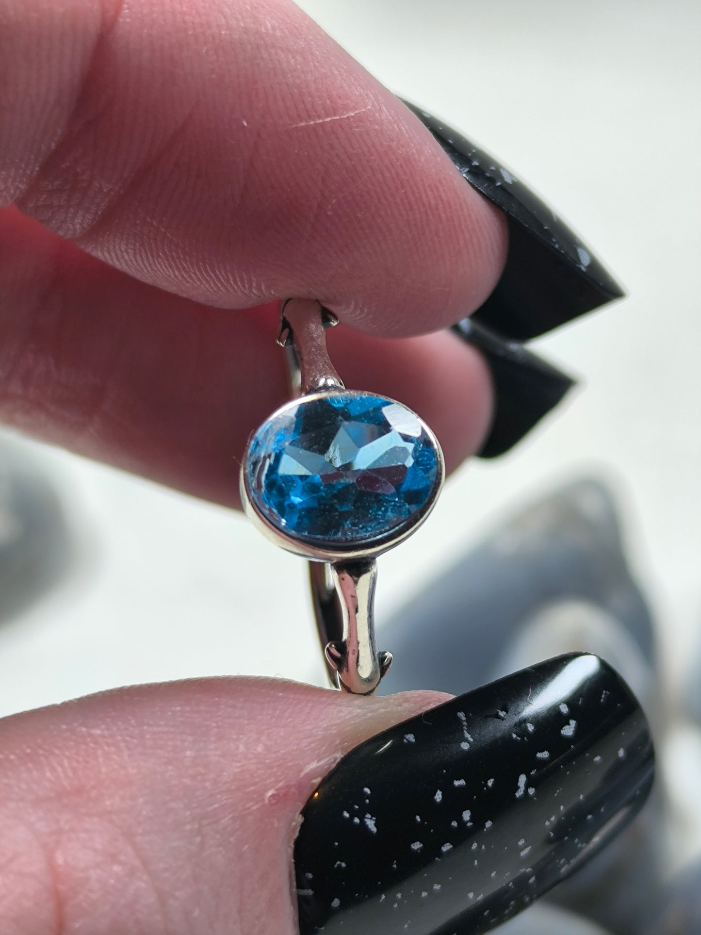 Sterling silver adjustable blue topaz ring