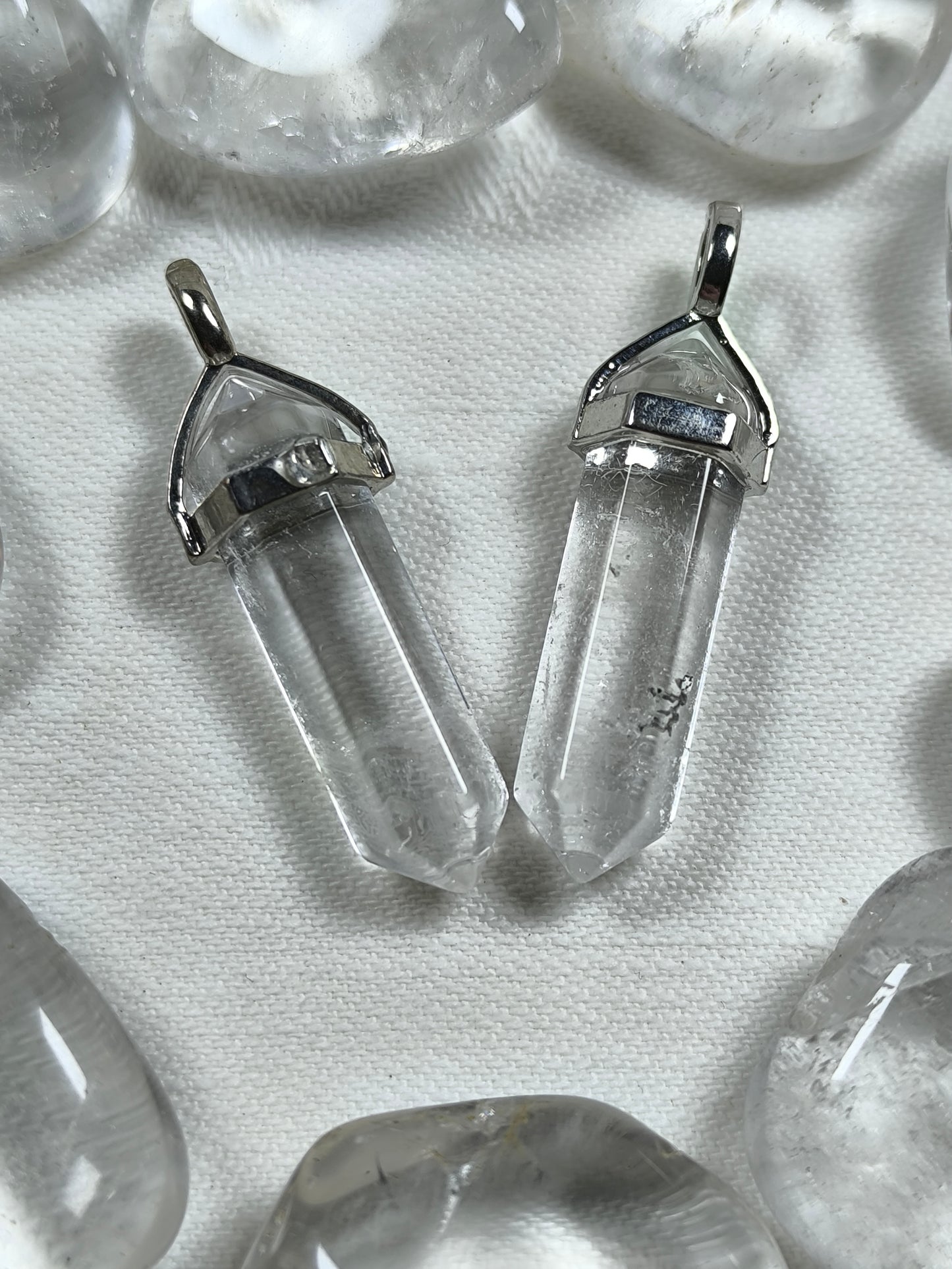 Clear quartz point pendants