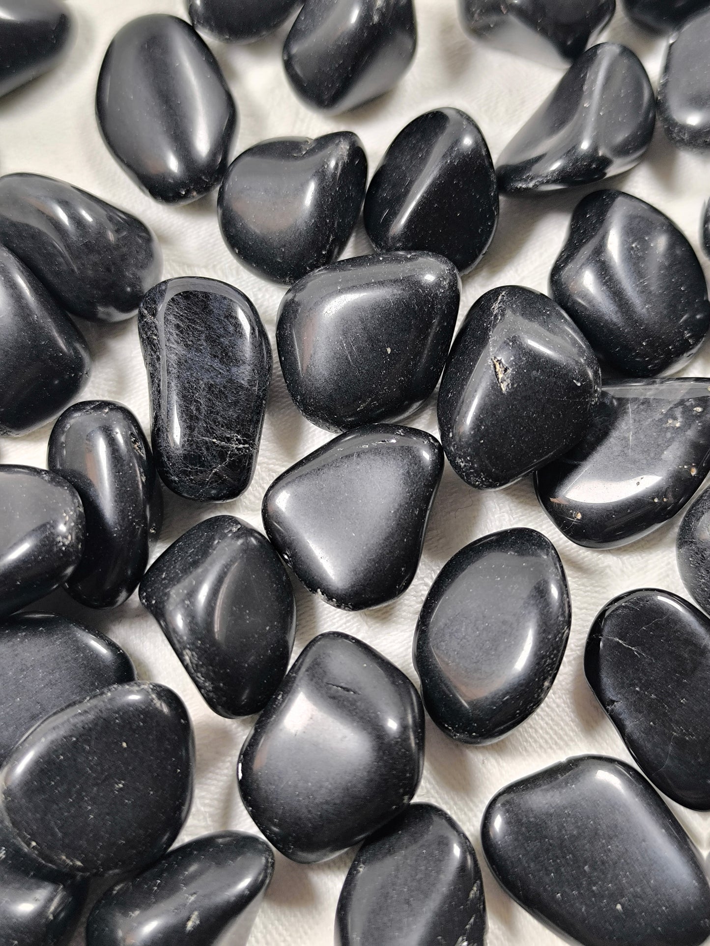 Black obsidian tumbles