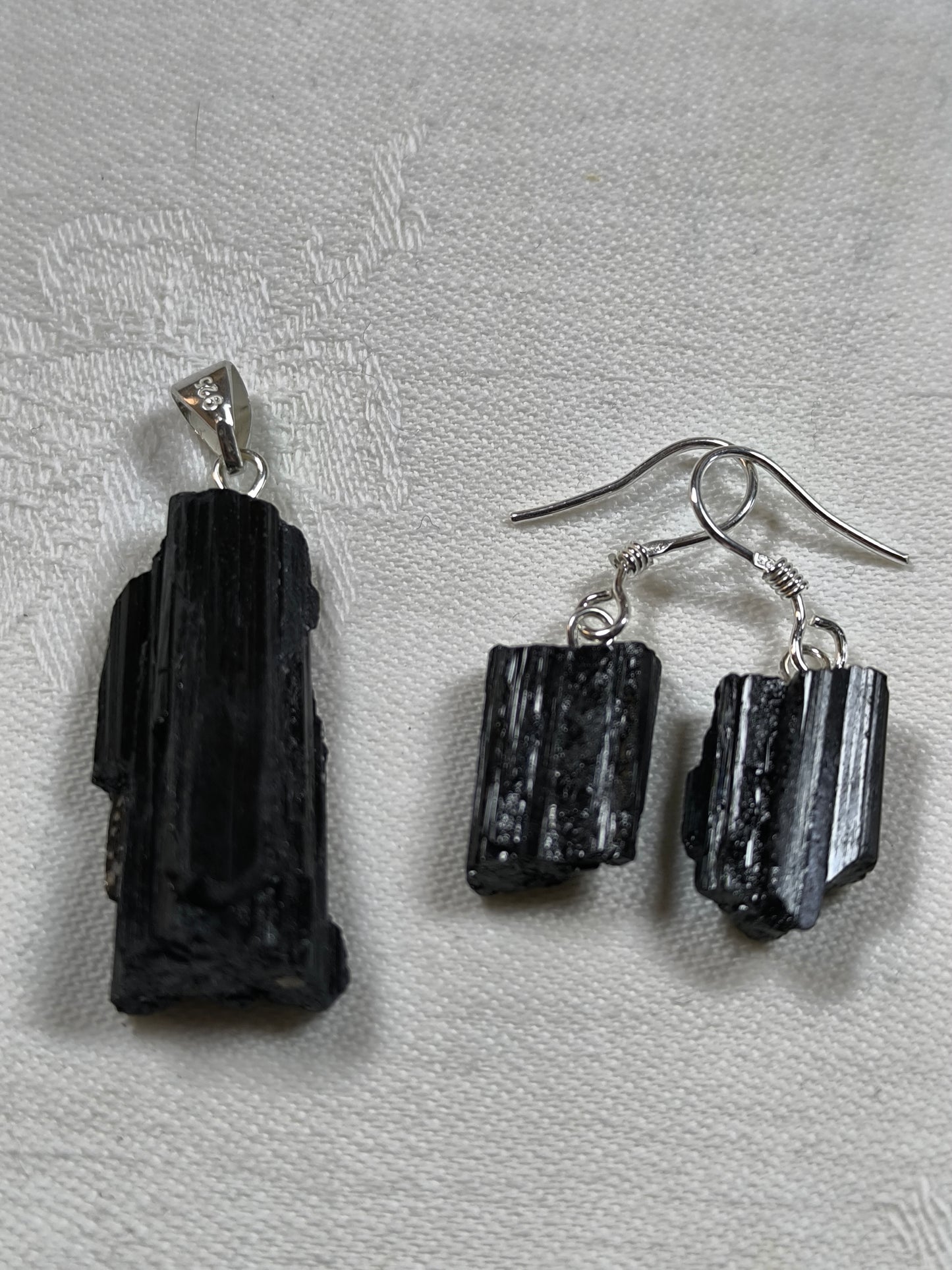 Sterling silver black tourmaline raw pendant & earrings.