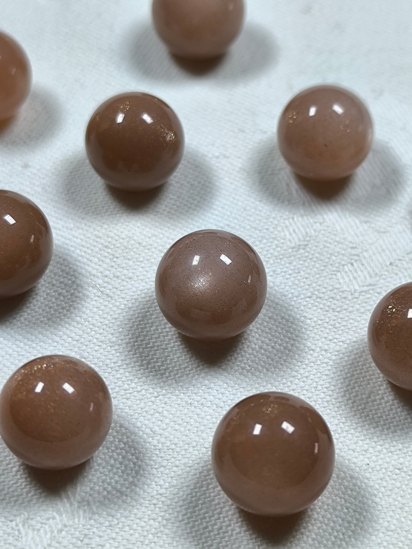 Mini peach moonstone spheres