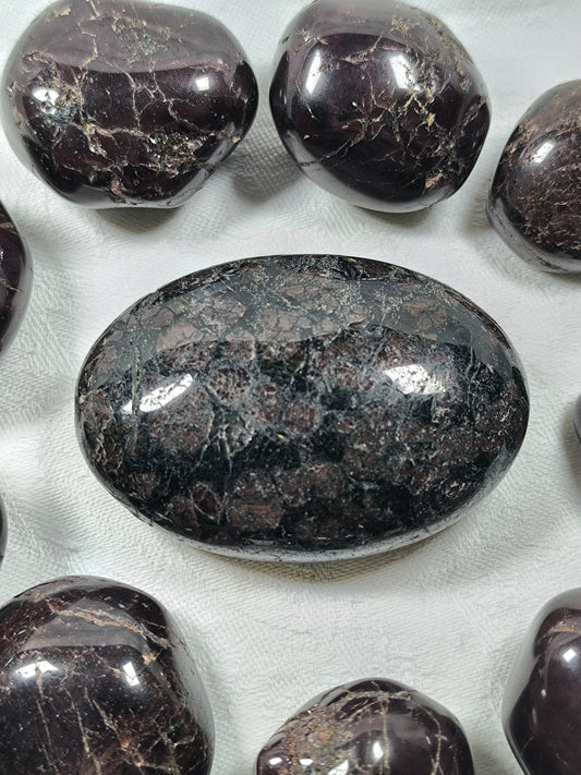 Garnet palm stone