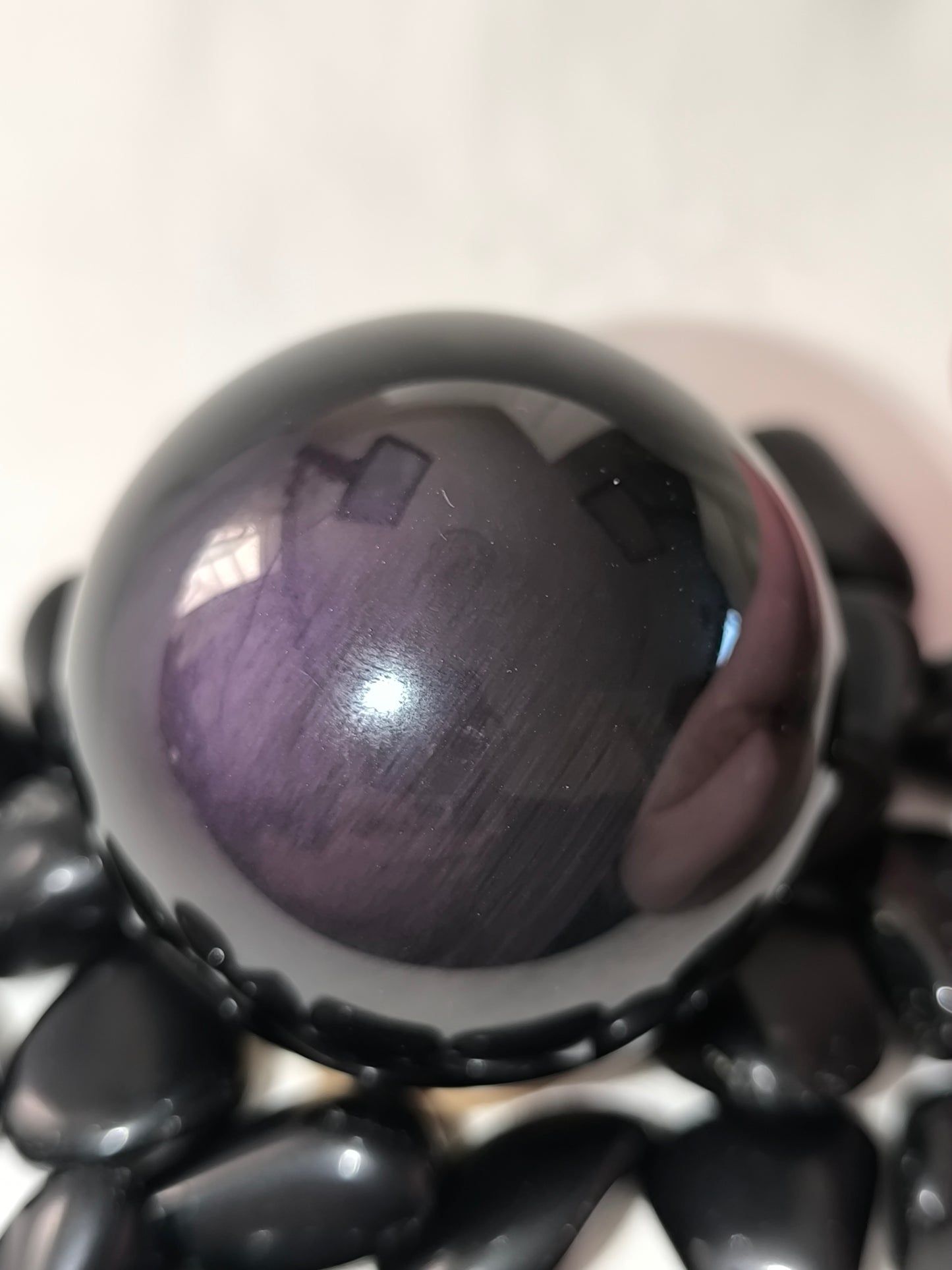 Rainbow obsidian sphere