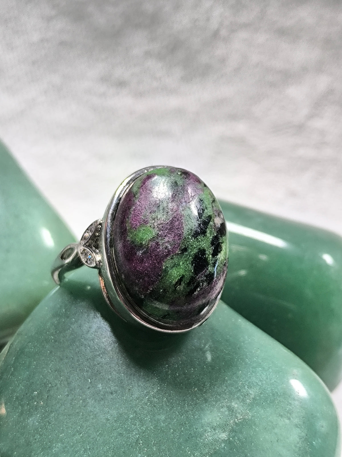 Stainless steel adjustable ruby in zosite ring