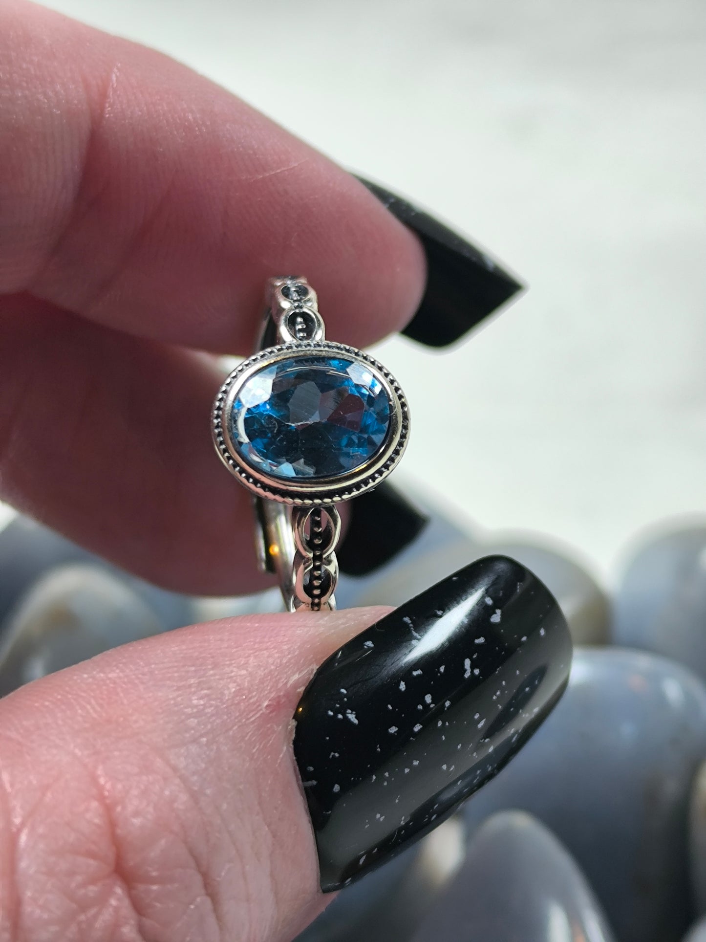 Sterling silver adjustable blue topaz ring