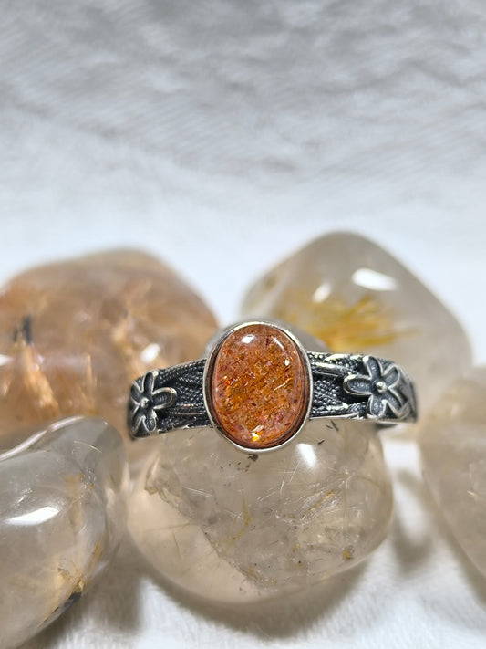 Sterling silver adjustable sunstone flower detail ring