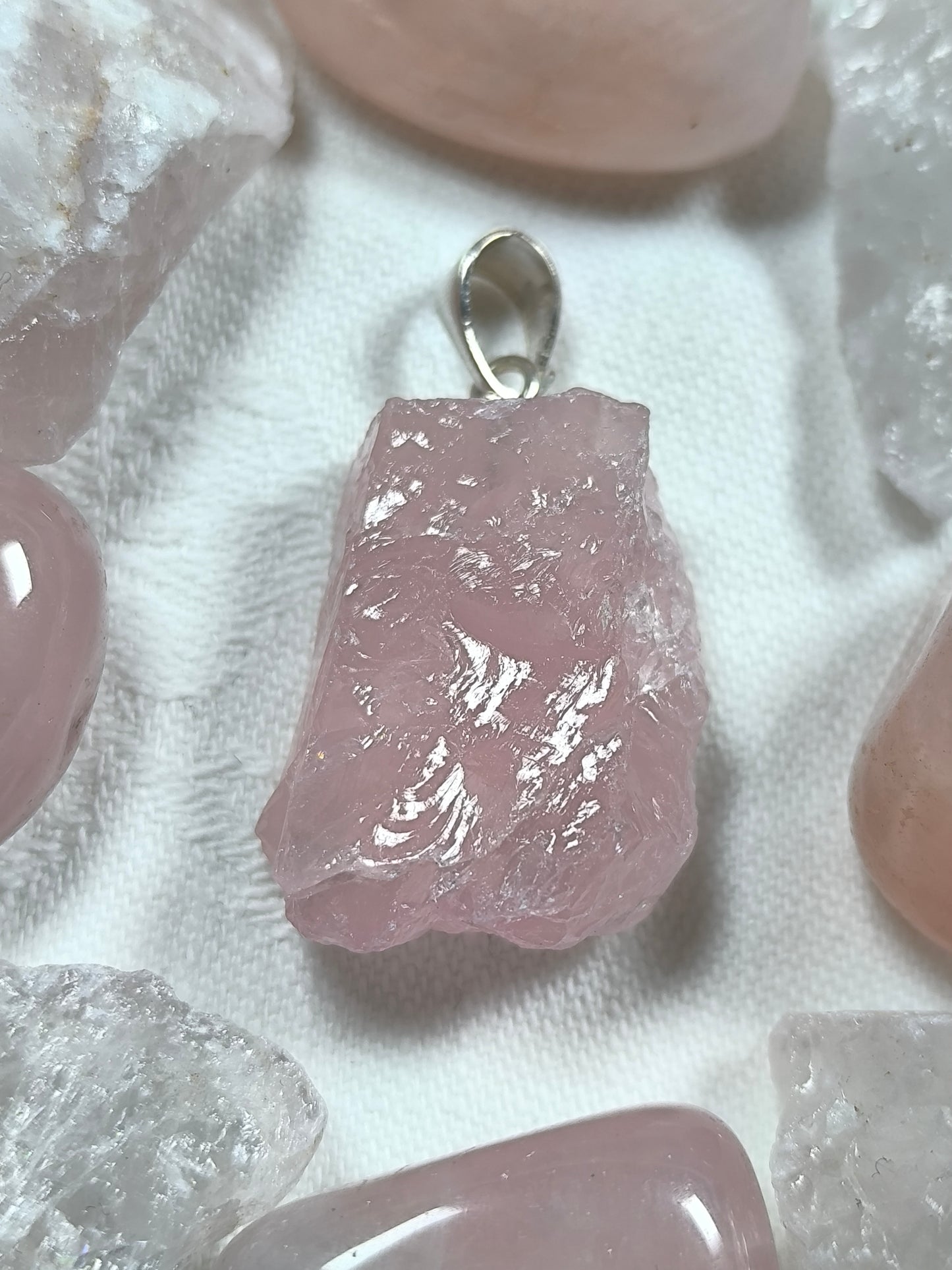 Sterling silver raw rose quartz pendant and earrings