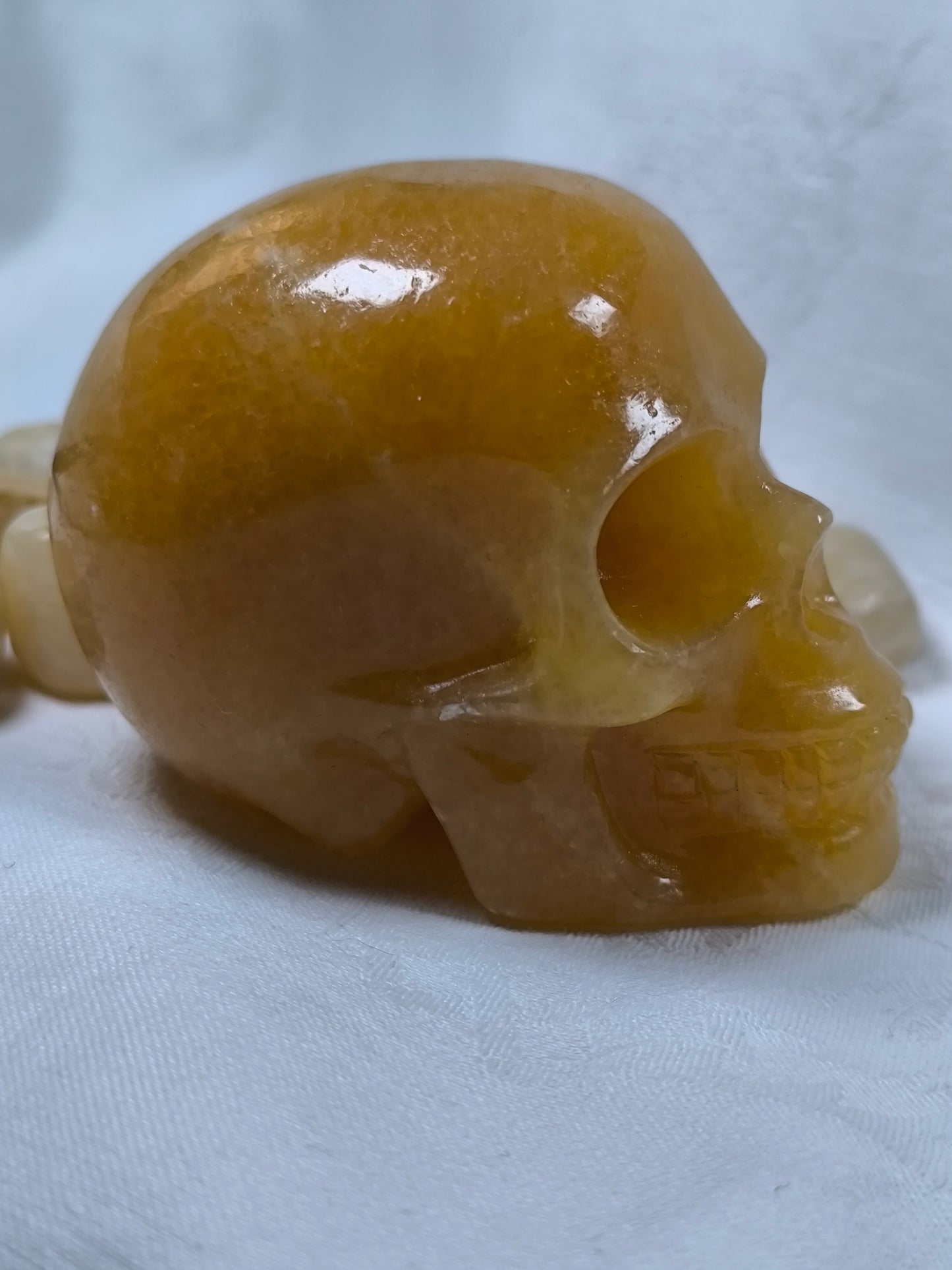 Yellow calcite skull