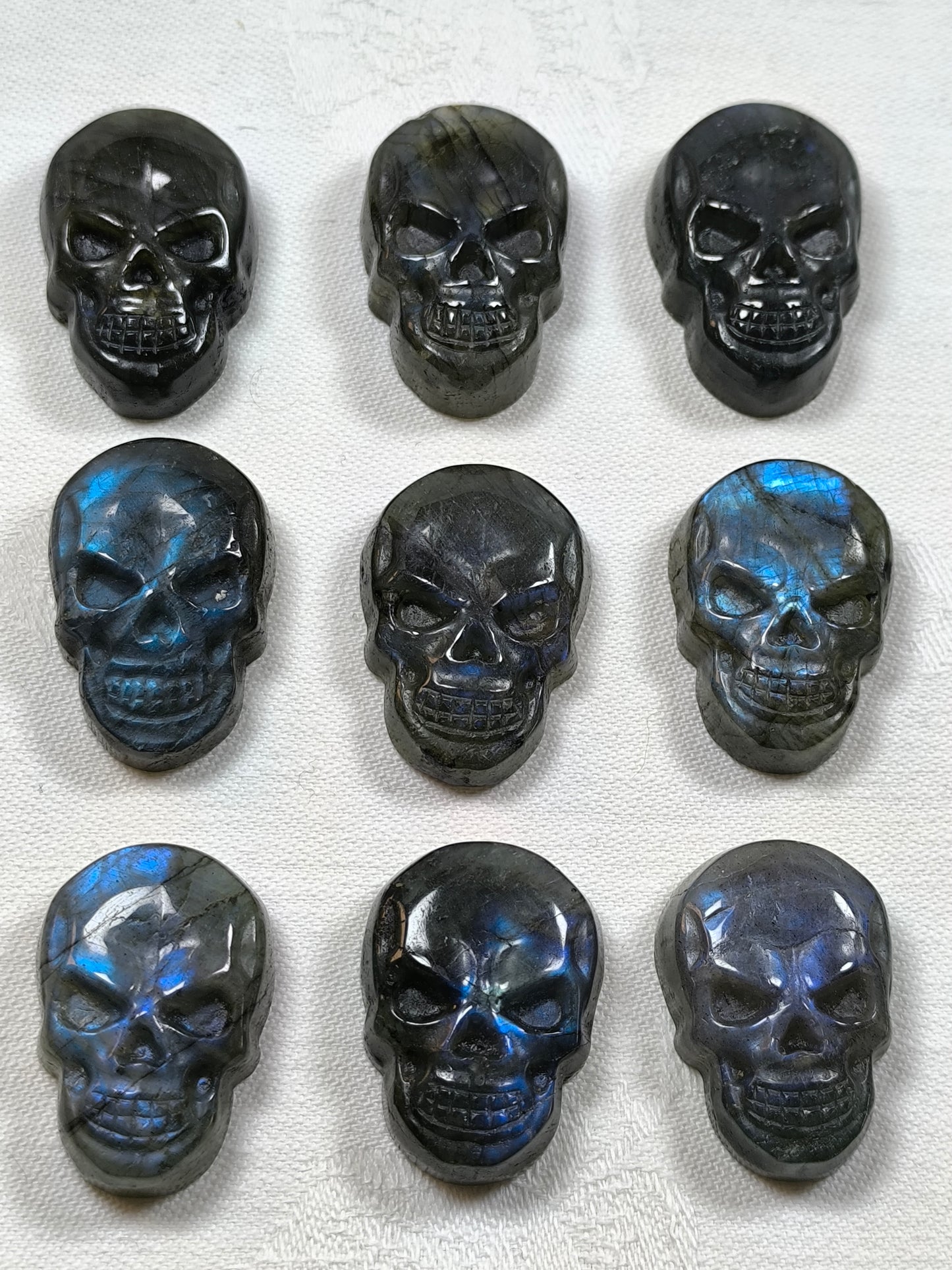 Flashy labradorite skulls