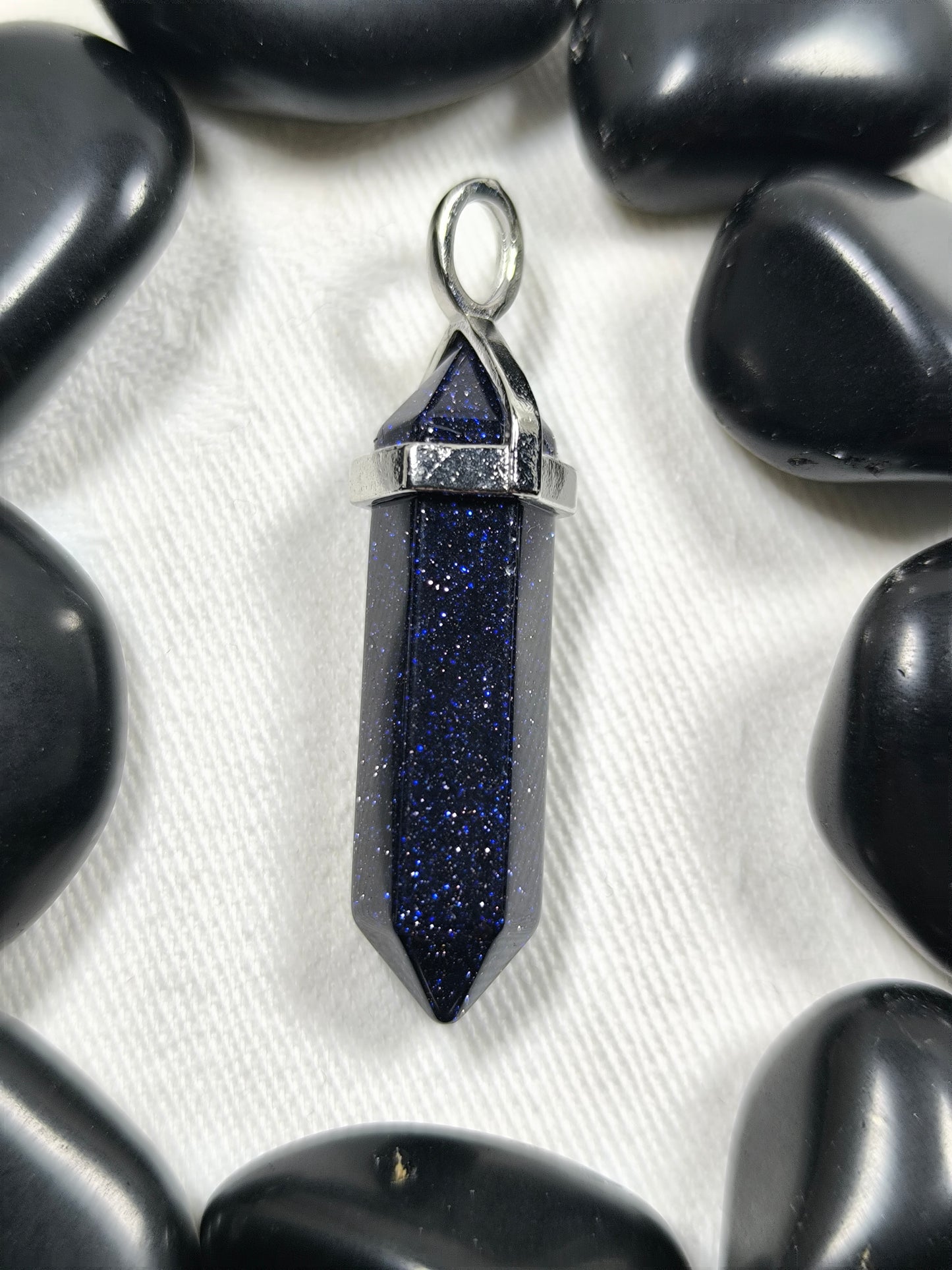 Blue goldstone point pendants