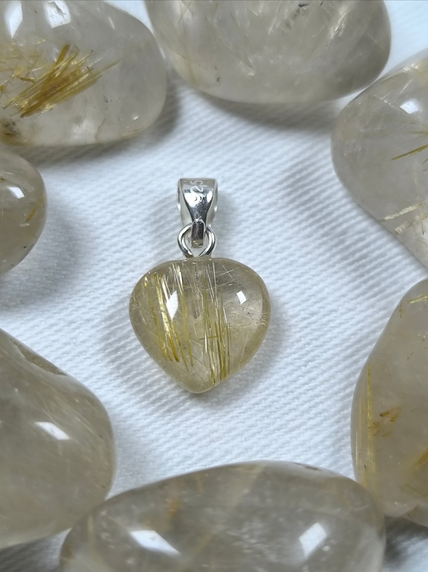 Sterling silver rutile mini heart pendant