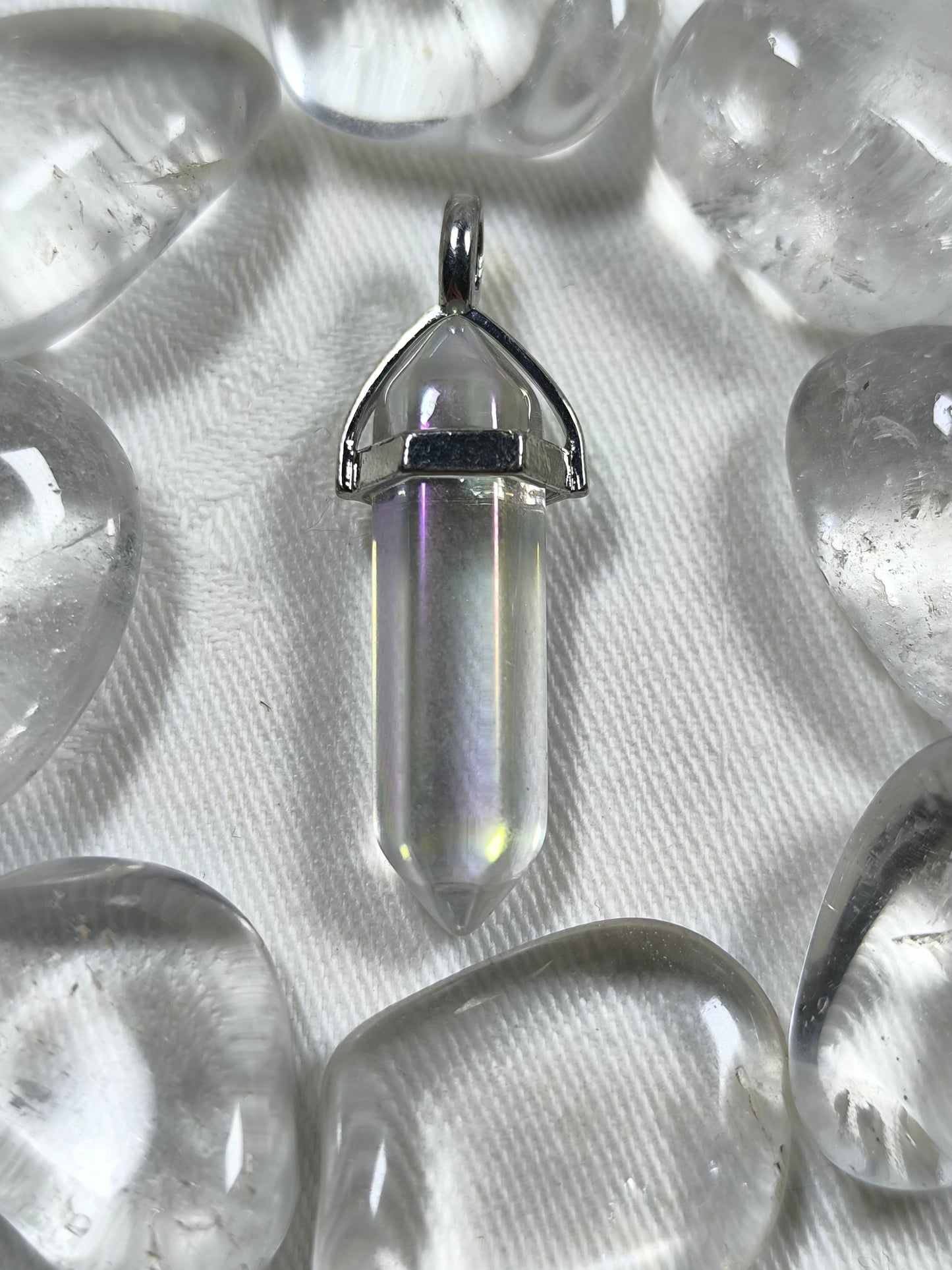 Aura quartz point pendants