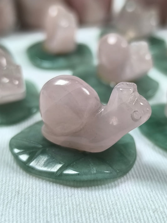 Rose quartz snails on lilypads