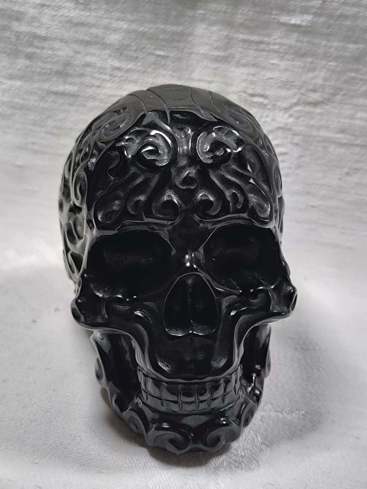 Black obsidian filigree skull