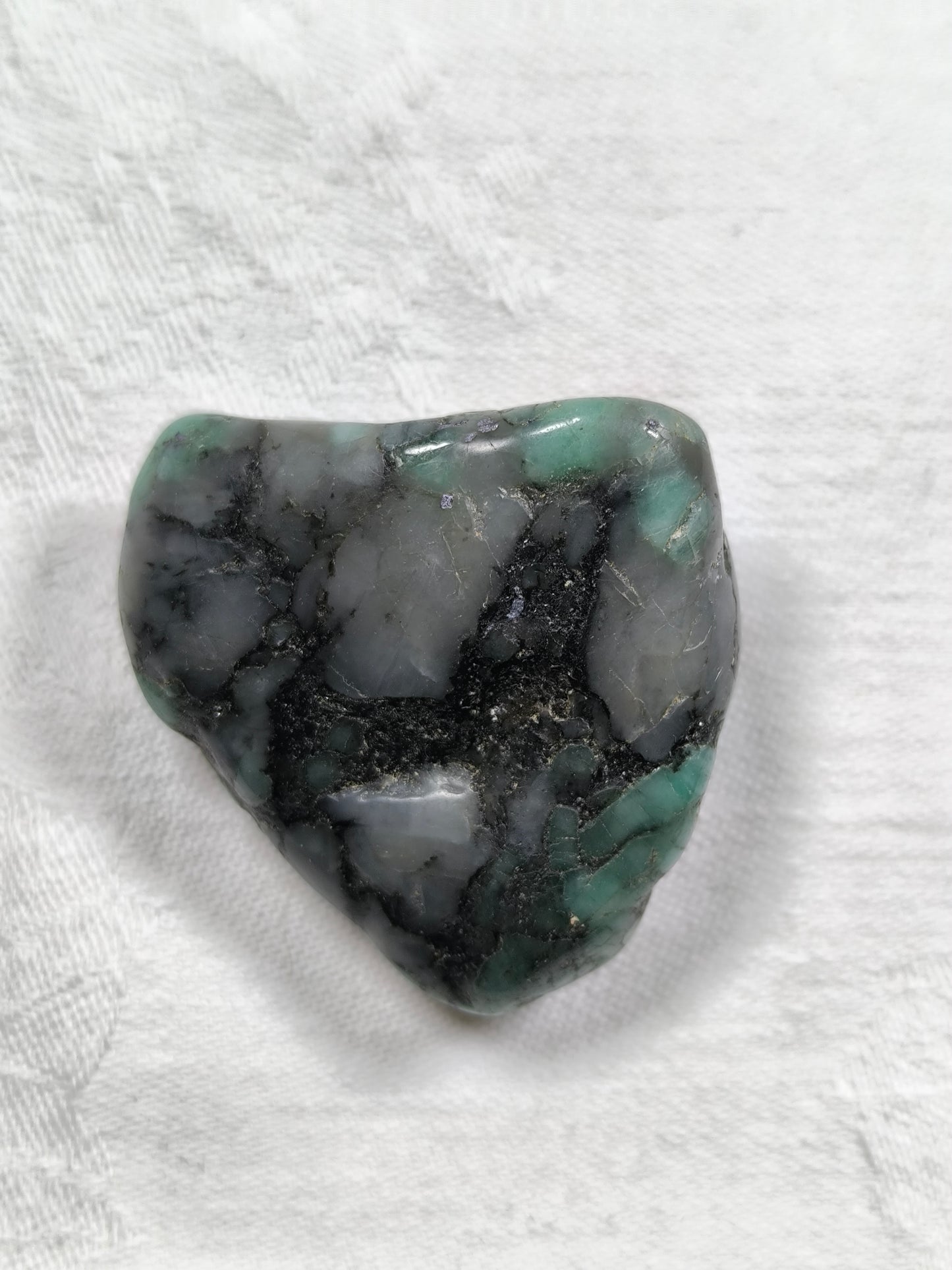 Large emerald tumbles