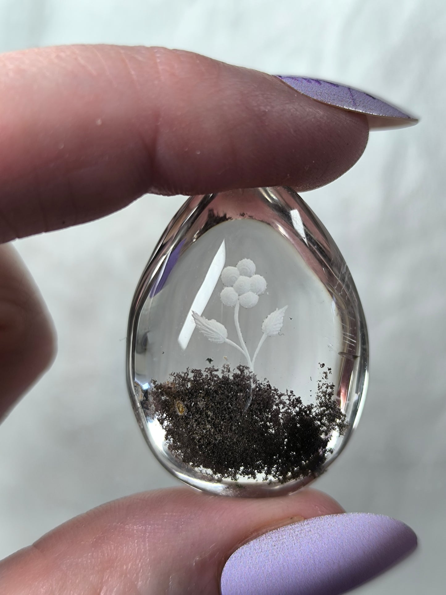 Lodolite in quartz inner flower carving