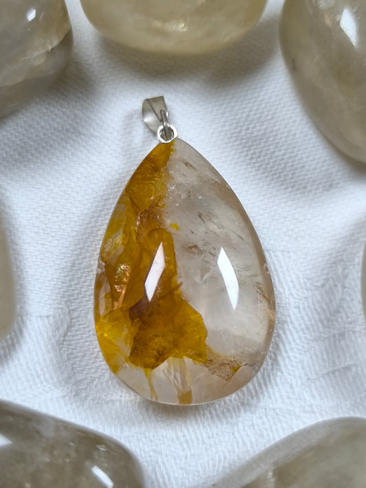 Golden healer teardrop pendant