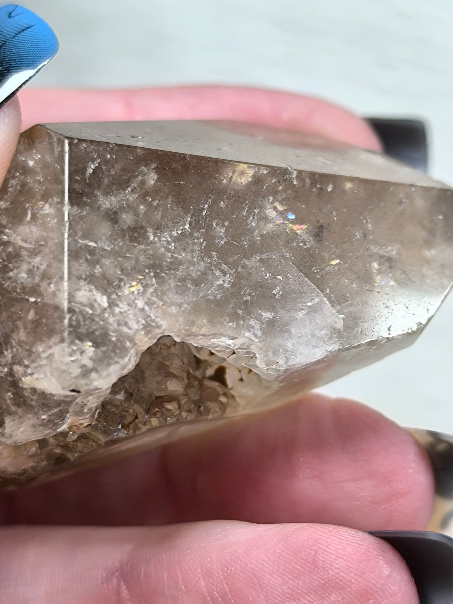 Part polished smoky quartz with rutile