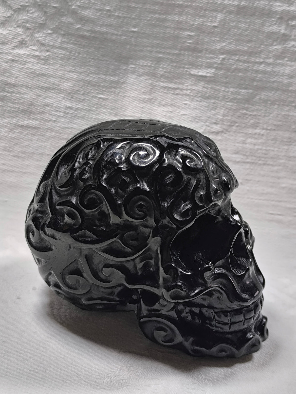 Black obsidian filigree skull