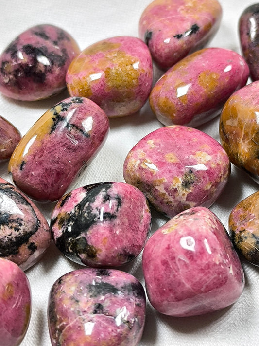 Rhodonite tumbles