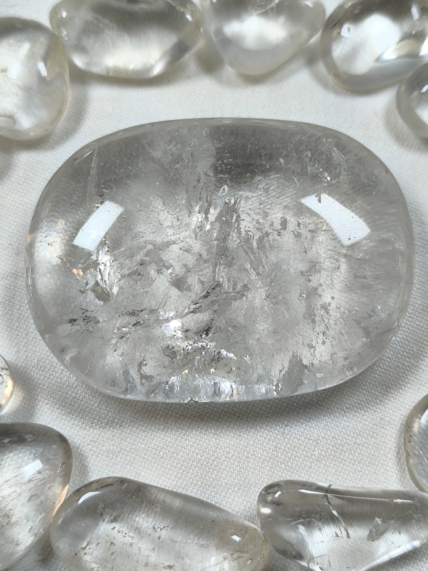 Clear quartz palm stone