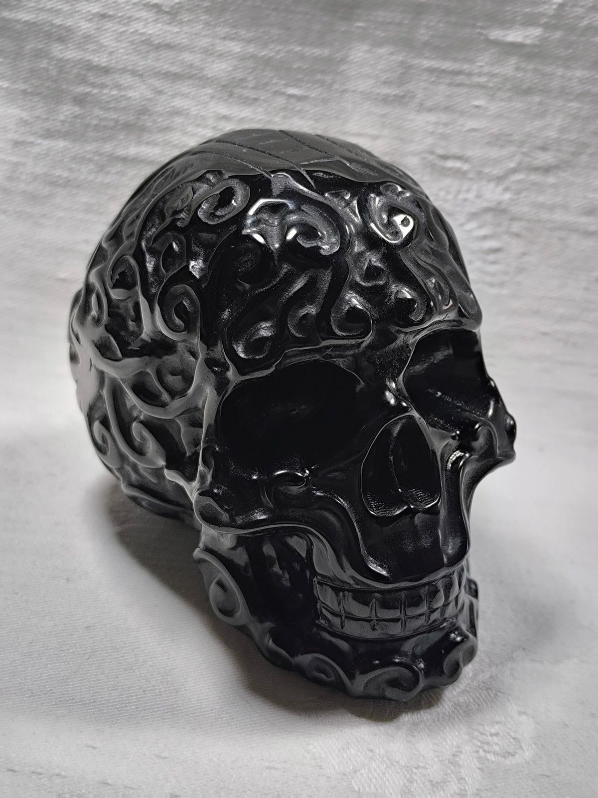 Black obsidian filigree skull