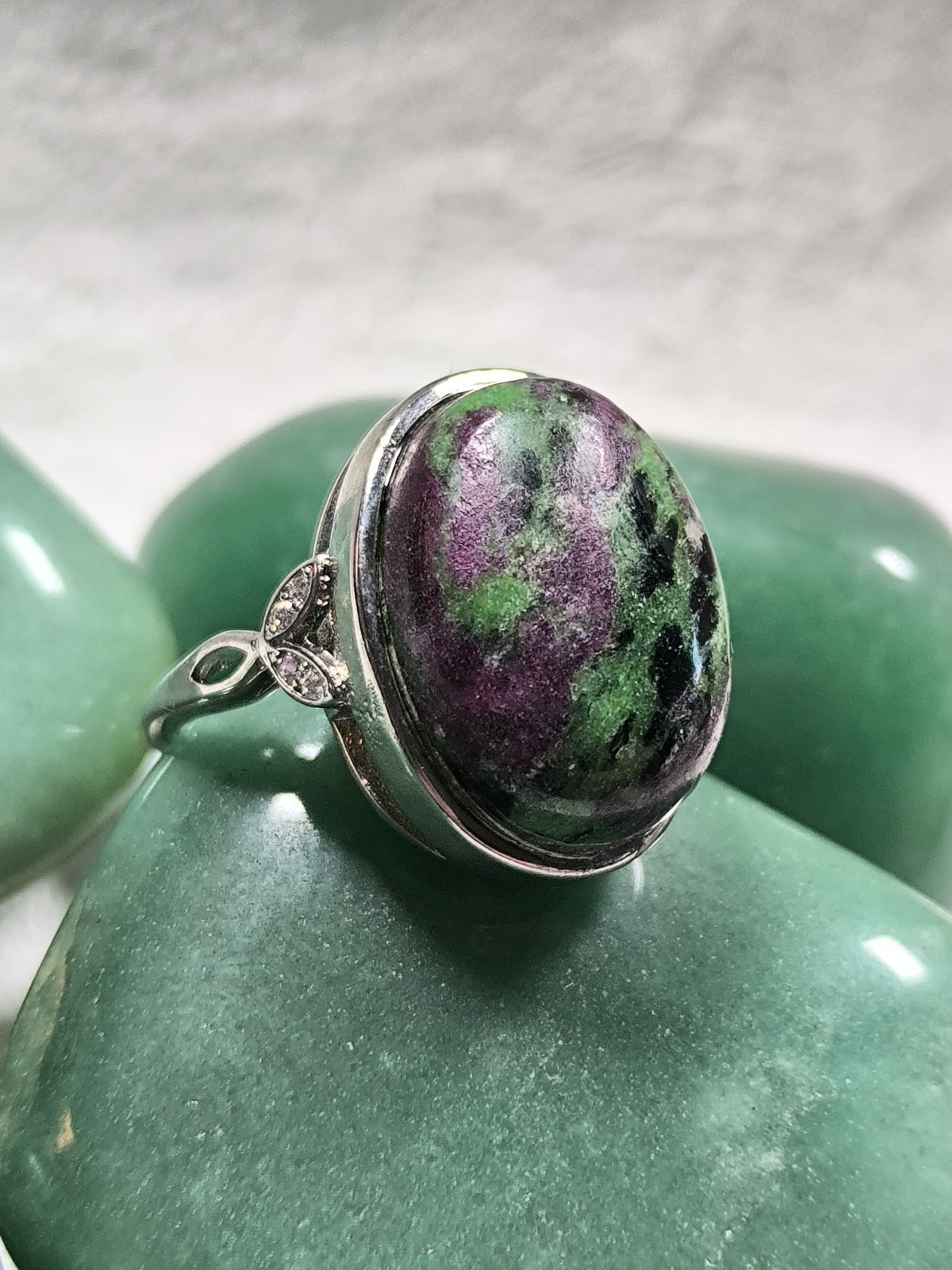 Stainless steel adjustable ruby in zosite ring