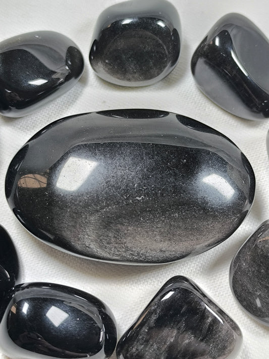 Silver sheen obsidian palm stone