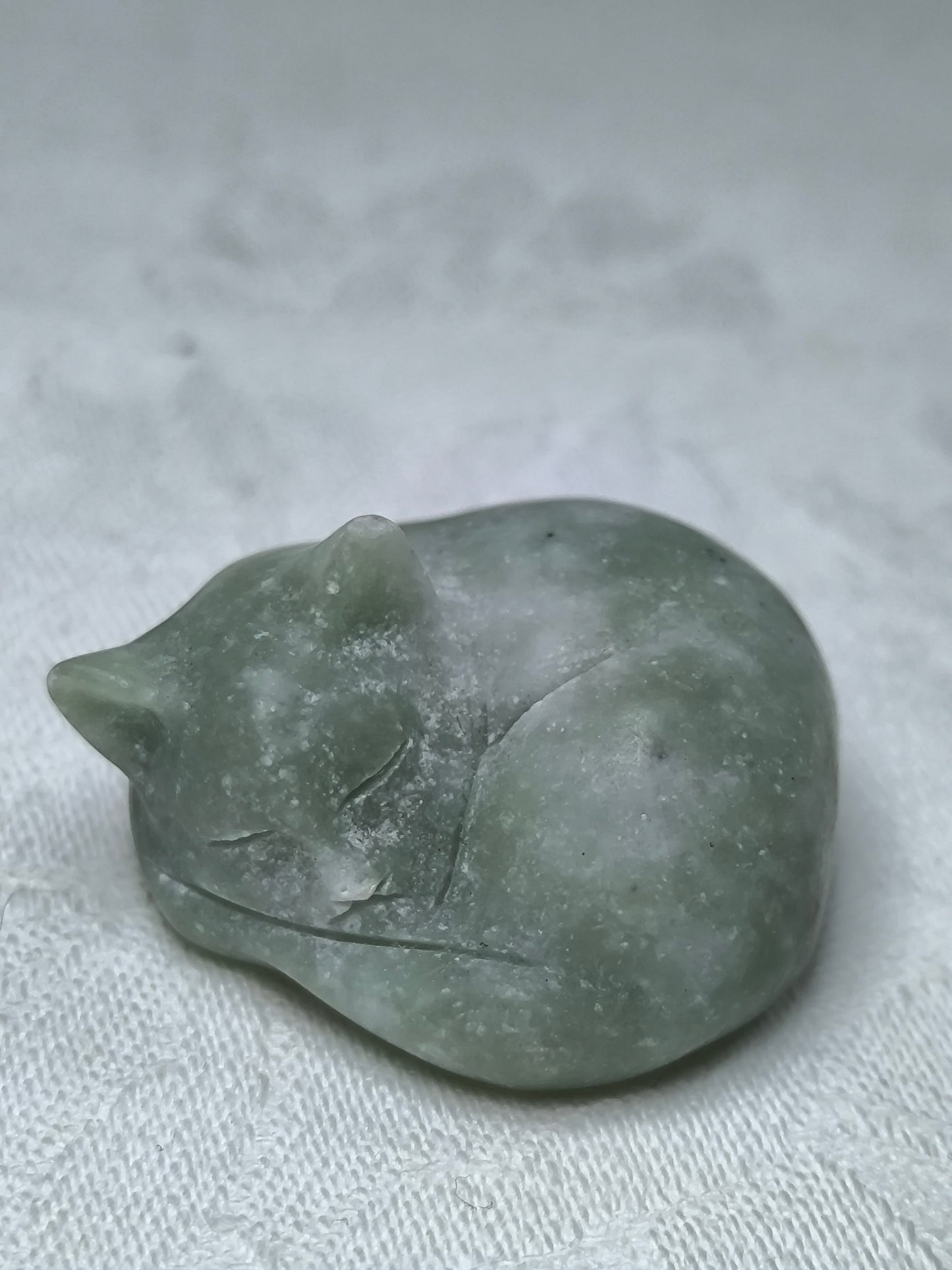 Green aventurine sleeping cats