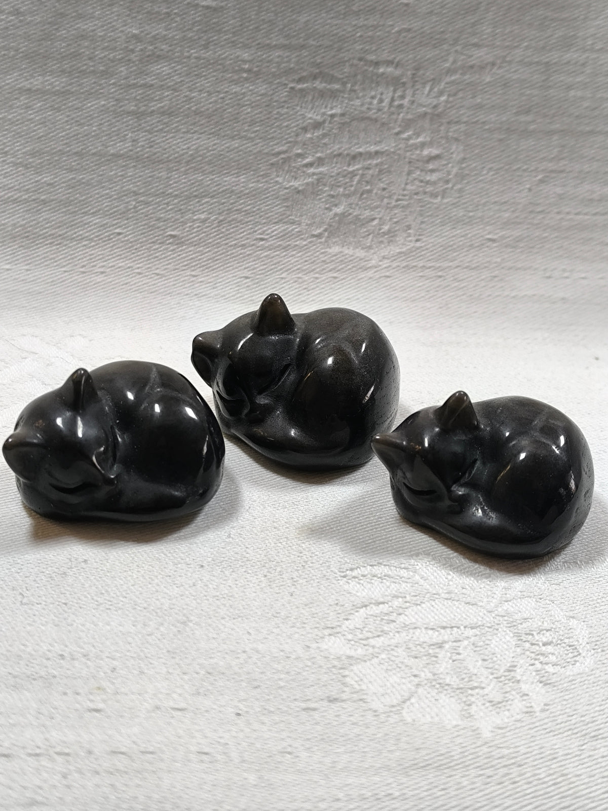 Silver sheen obsidian sleeping cats
