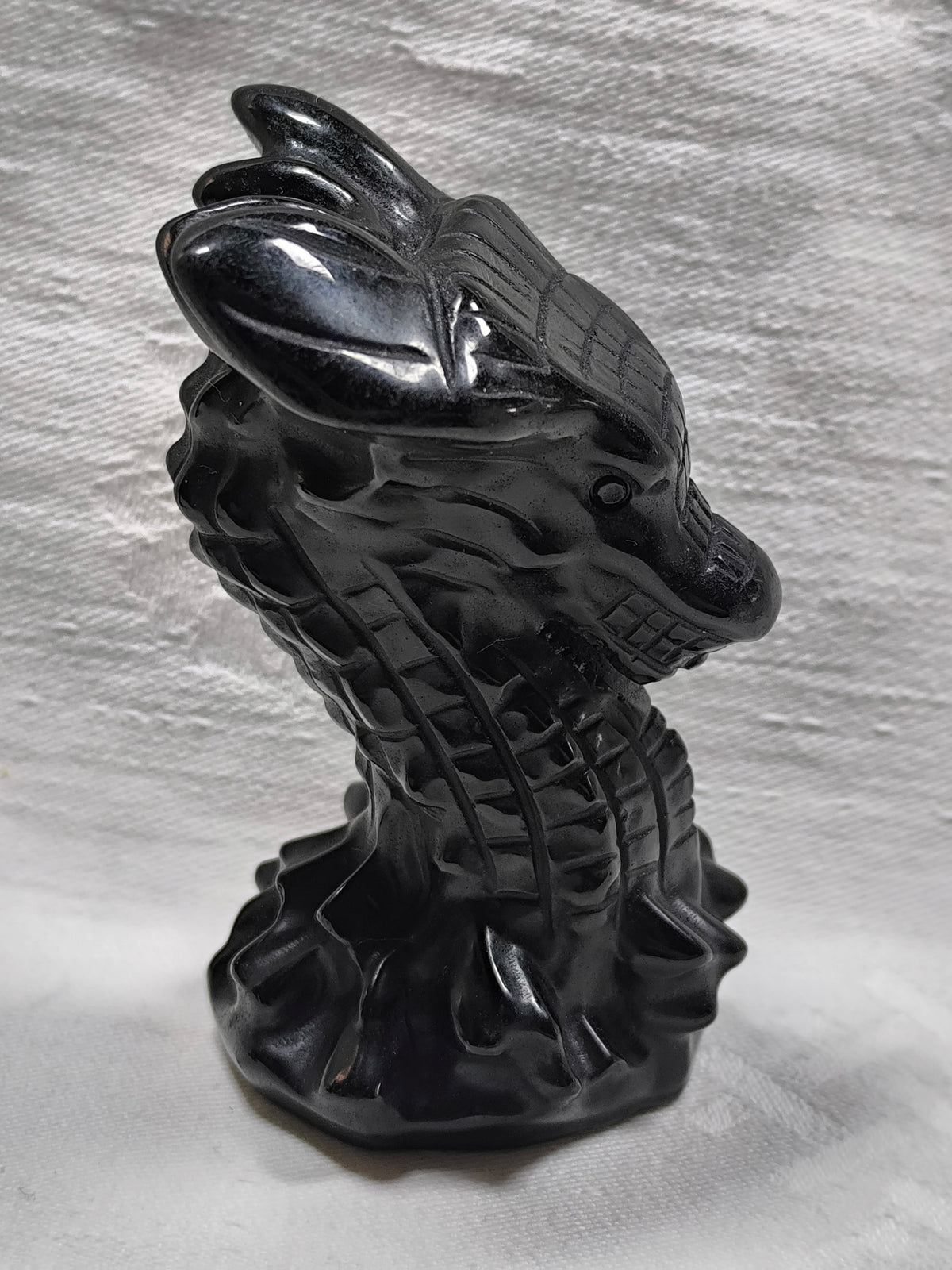 Black obsidian dragon head
