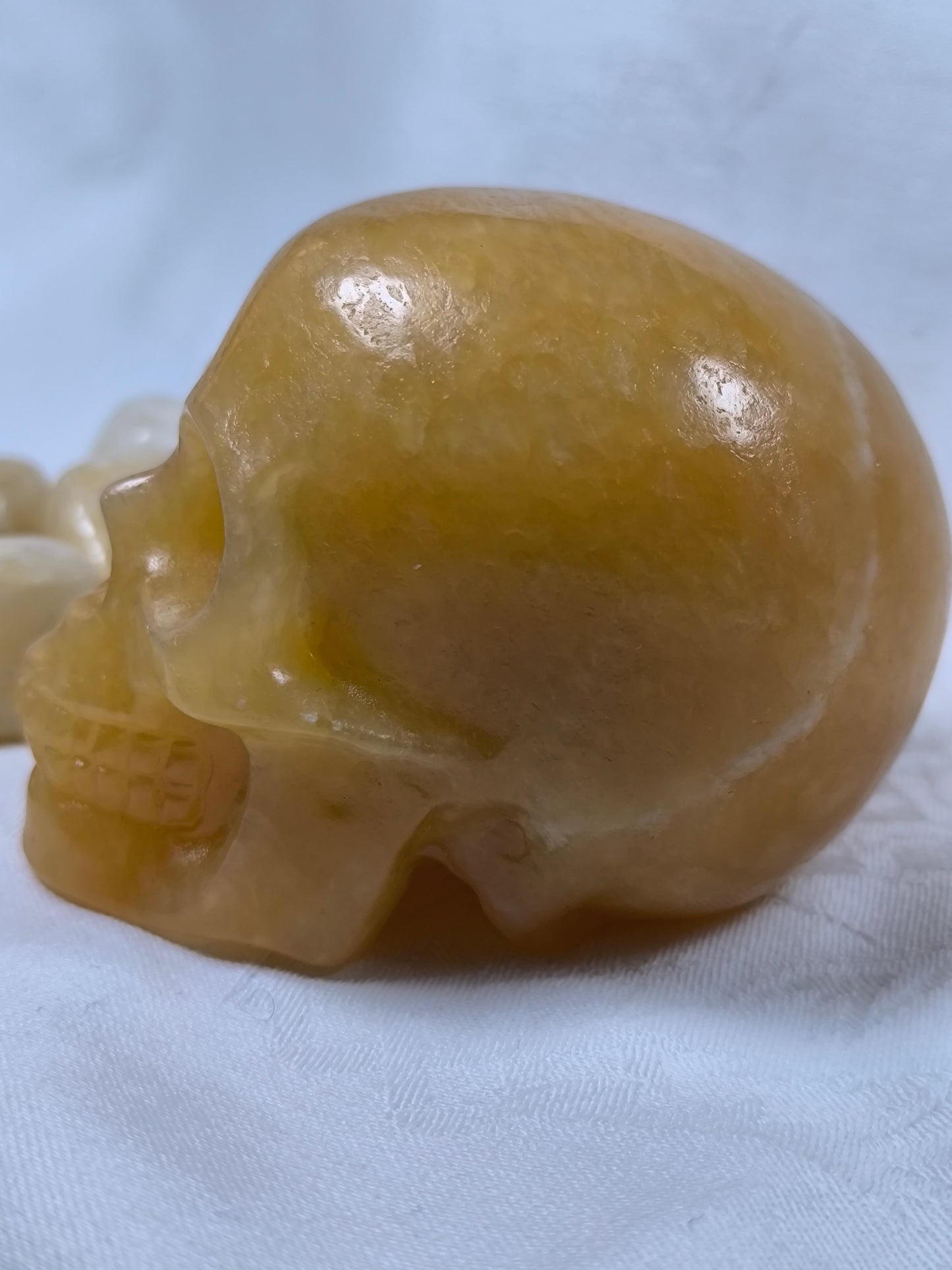 Yellow calcite skull